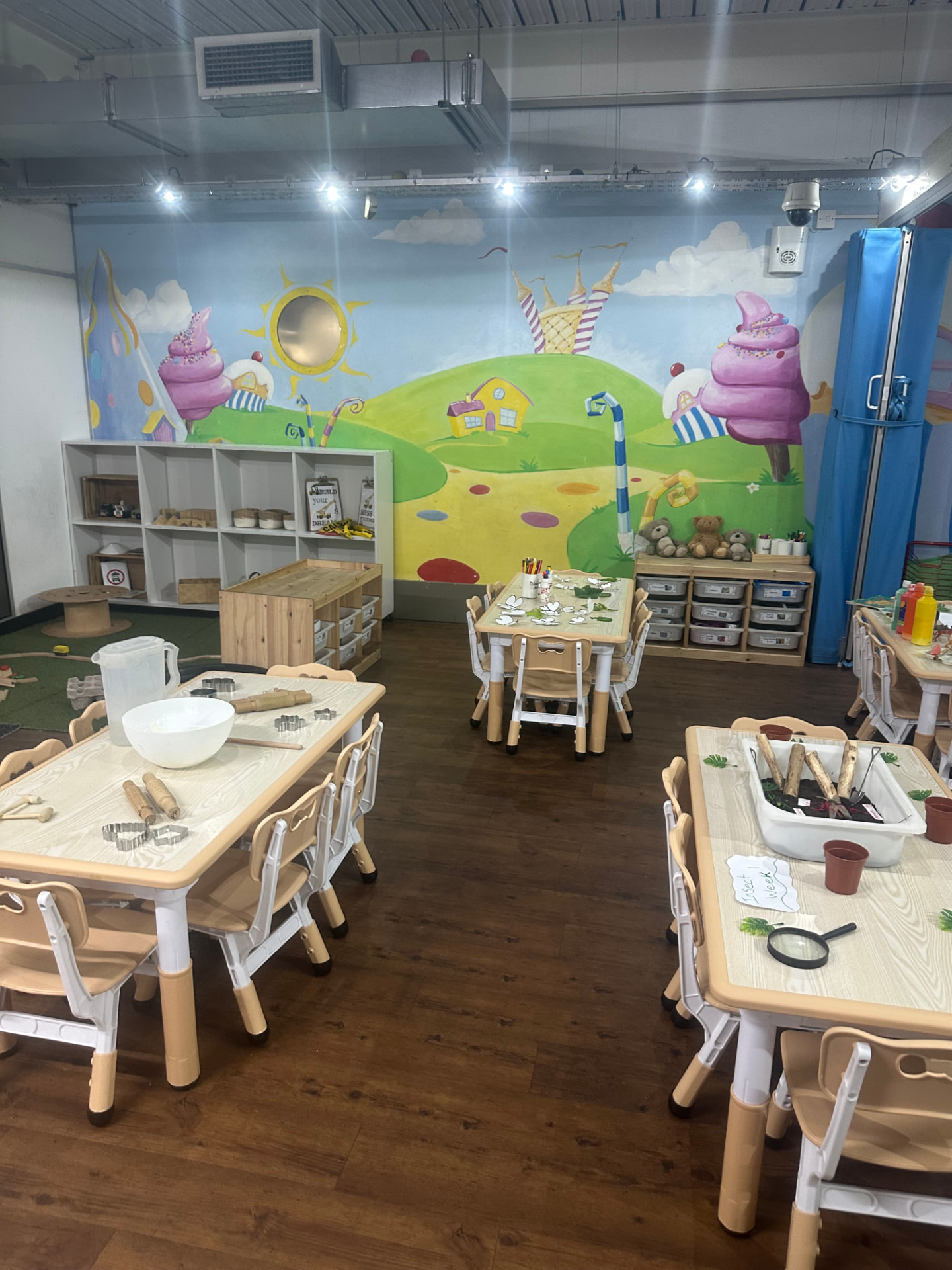 Children and staff during an activity at Teenie Weenies nursery in Birmingham